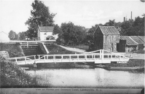 The construction of the Lambertville Outlet Lock in 1848 linked the Delaware and Raritan Feeder Canal to the Delaware Division Canal in New Hope, Pennsylvania by means of a cable ferry across the Delaware River.  Canal boats carrying coal from the Lehigh Valley could cross the river into New Jersey and proceed downstream for transshipment at the “Coalport” in Trenton without having to proceed to Bristol, Pennsylvania and then upriver to gain access to the Delaware and Raritan Canal at Lock No. 1 in Bordentown.  The Delaware Canal insisted, however, on charging full tolls to Bristol on those boats which made the transfer at New Hope.  The cable ferry/outlet lock was an important innovation that allowed the Feeder Canal to be an avenue of commerce in its own right.
